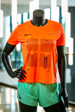 Women's Rimi Riga Marathon 2021 Nike running shirt (orange)